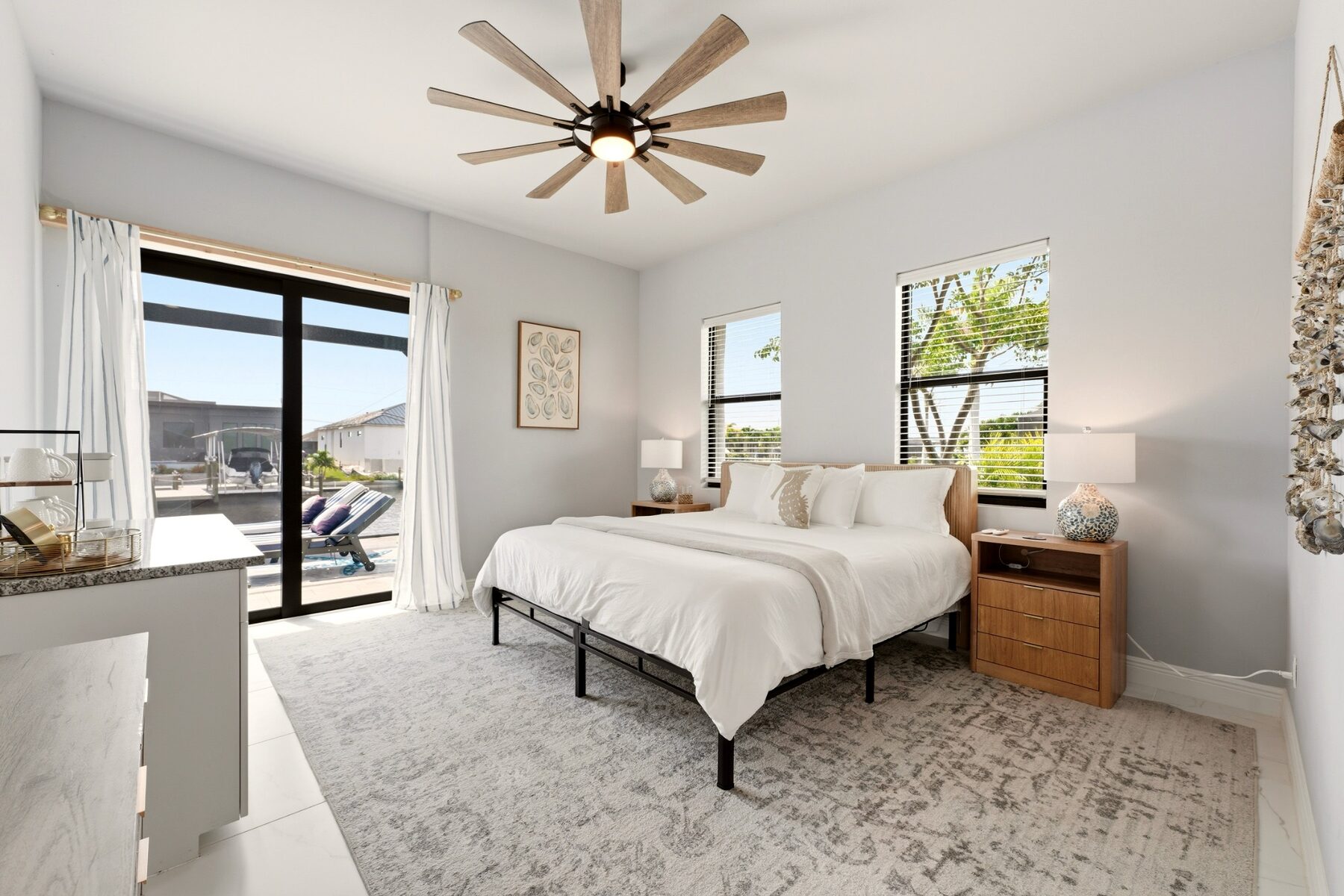 King bedroom with direct access to the pool deck